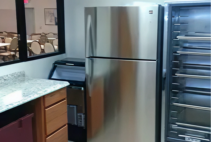 Stainless steel refrigerator in a modern kitchen.